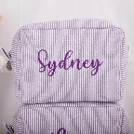 Trousse de toilette personnalisée rayée – Prénom brodé